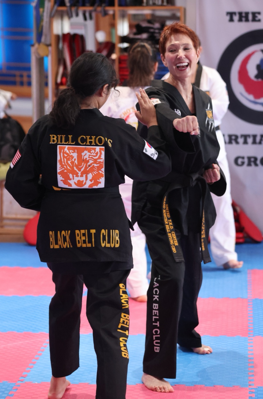Back of a Bill Cho's Black Belt Club dobok with the school tiger logo