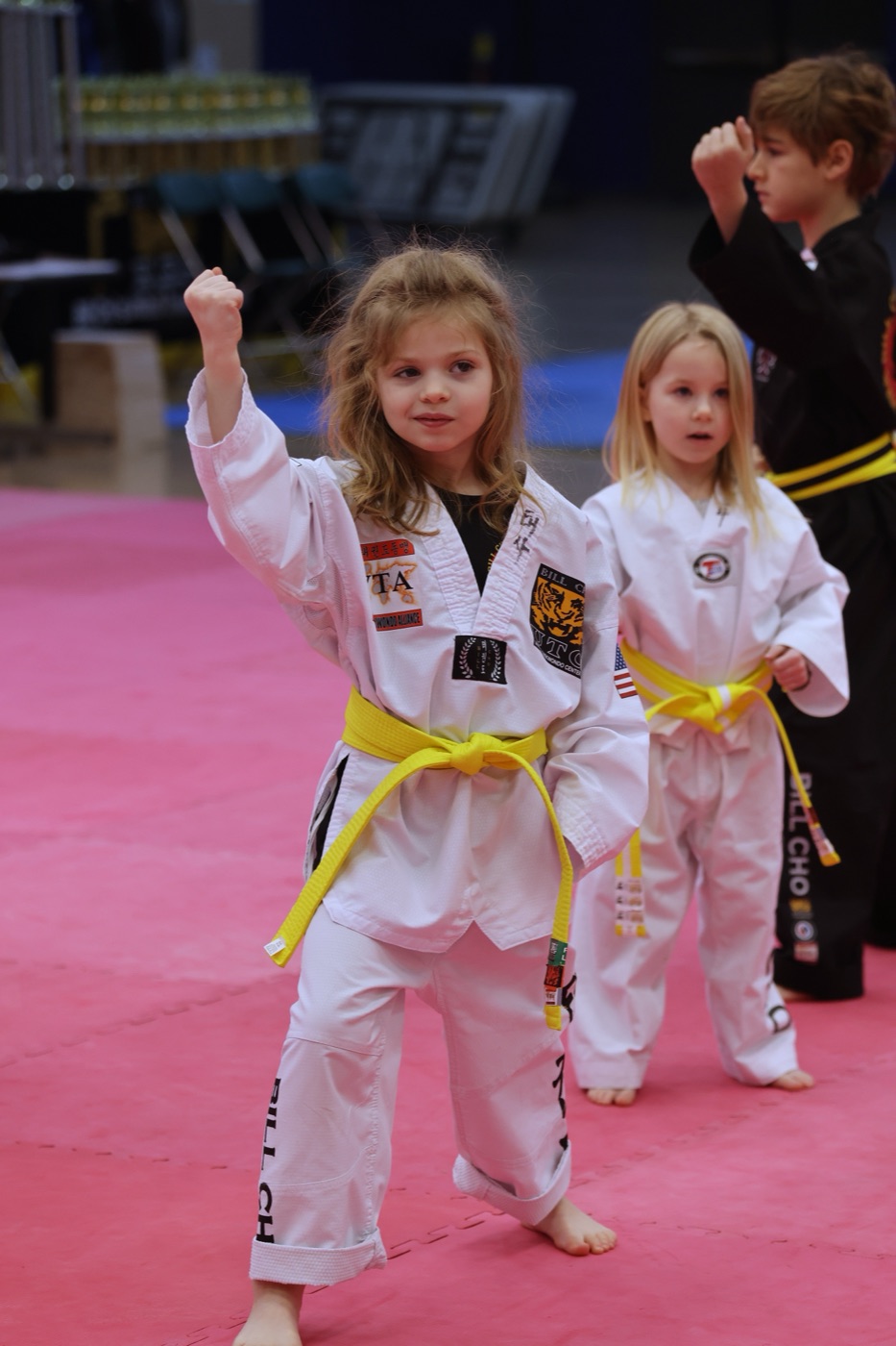 Little Tiger student with yellow belt doing a focused technique at Bill Cho's dojang